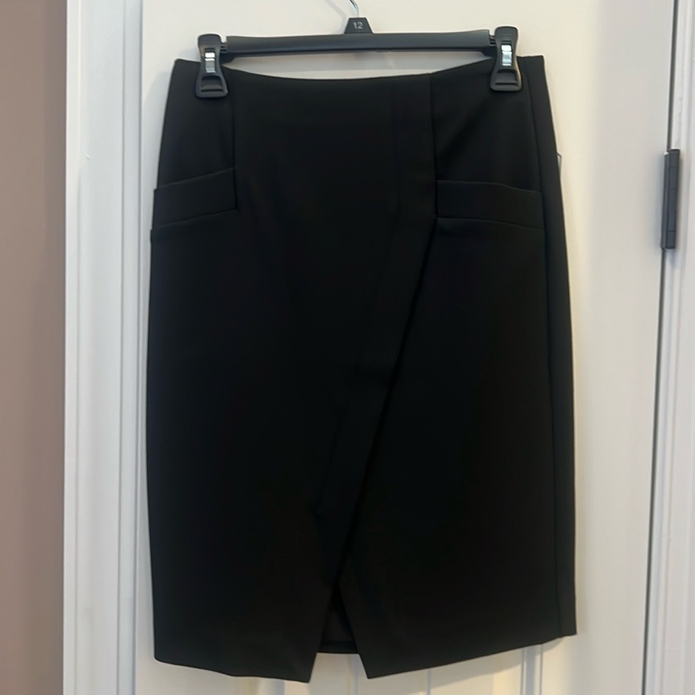 The loft size 2 pencil skirt with front pocket detailing and asymmetrical design